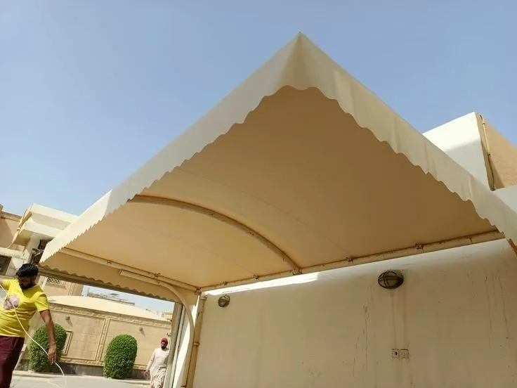 تركيب مظلات سيارات مقص ومظلات مداخل في الجنوب وأبها