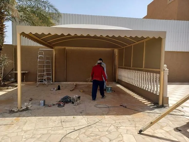 تركيب مظلات سيارات مقص ومظلات مداخل في الجنوب وأبها