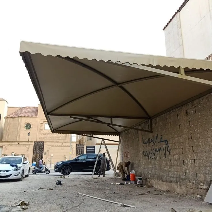 تركيب مظلات سيارات مقص ومظلات مداخل في الجنوب وأبها